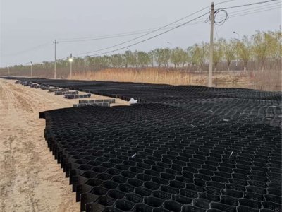 Honeycomb geocell subgrade reinforcement